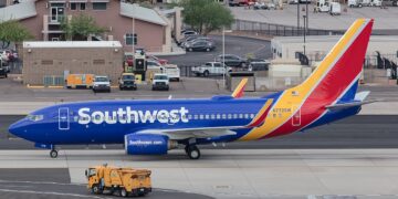 PASSENGERS PANIC AS SOUTHWEST AIRLINES PASSENGER JUMPED OUT OF THE EMERGENCY EXIT AT A LOUISIANA AIRPORT